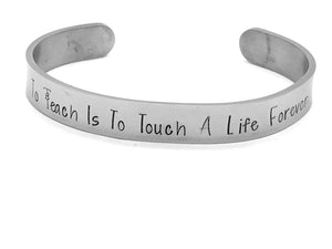 "To Teach is to touch a life forever"